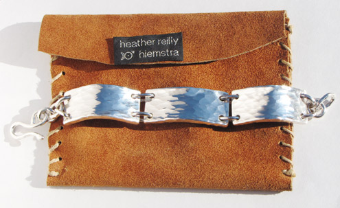 Wide bar bracelet and pouch