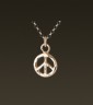 small gold peace pendant