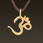 ohm pendant shown in 22k yellow gold on natural rawhide ohm pendant shown in 22k yellow gold on natural rawhide