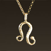 zodiac pendants: leo pendant shown in 14k yellow gold on a traditional chain zodiac pendants: leo pendant shown in 14k yellow gold on a traditional chain