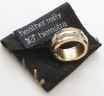 yellow gold ring with rolling white gold diamond band